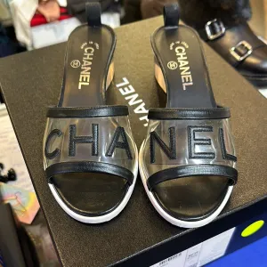 Chanel Black PVC Sandal with CHA-NEL in leather and Clear Chunky Heel