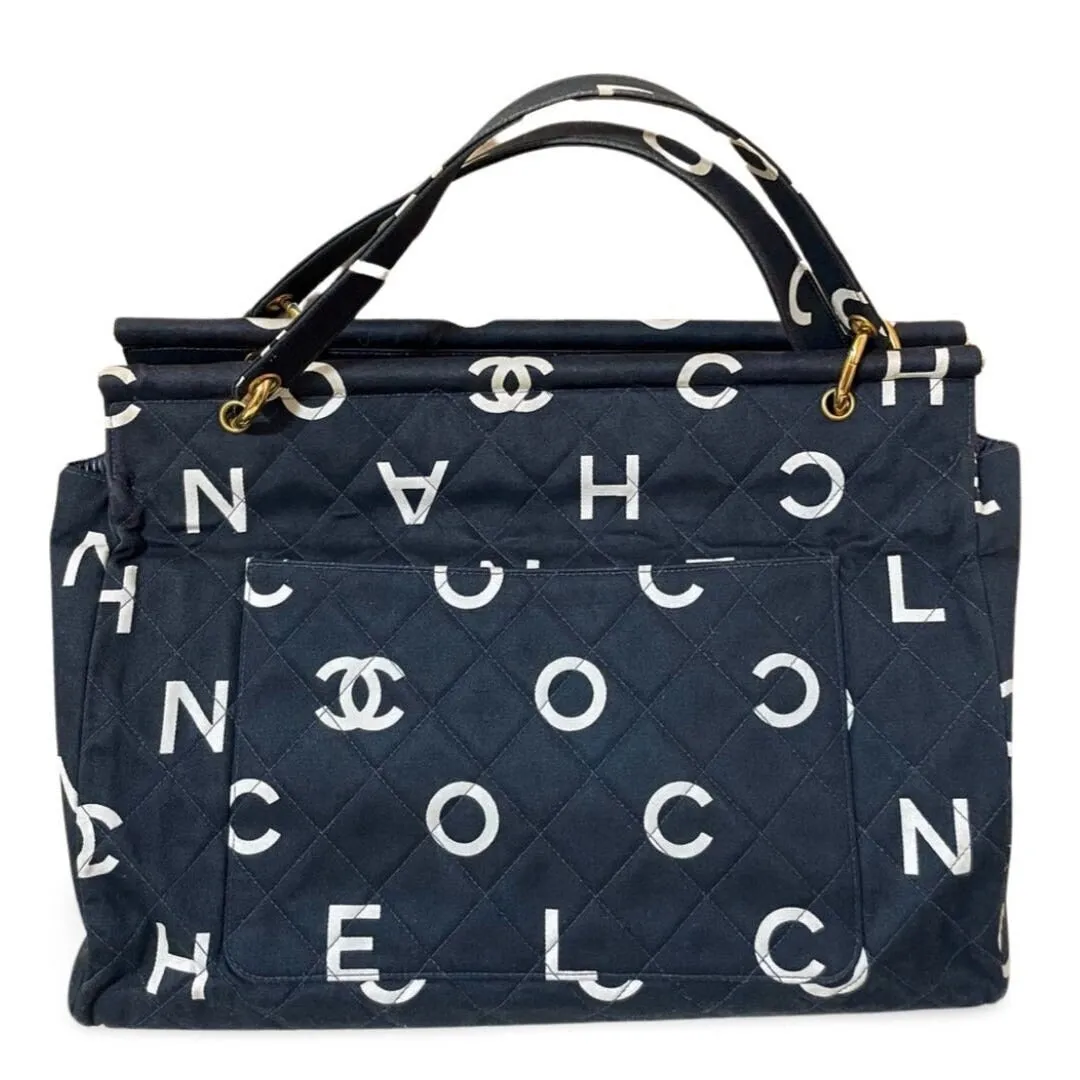 Vintage CHANEL black fabric canvas large tote bag with white Chanel CC logo print all over. Daily use bag. 060123ac13