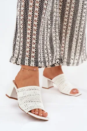 Women's slippers with a braid