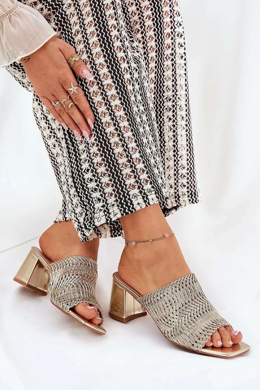 Women's slippers with a braid