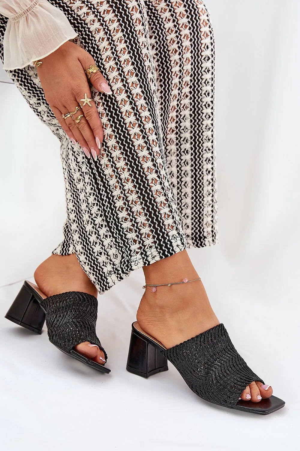 Women's slippers with a braid